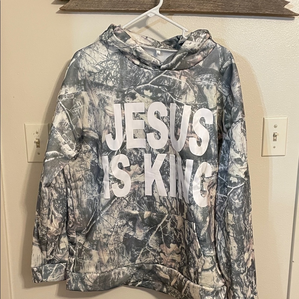 Brand new never worn Camouflage Hoodie with 'Jesus Is King' Print